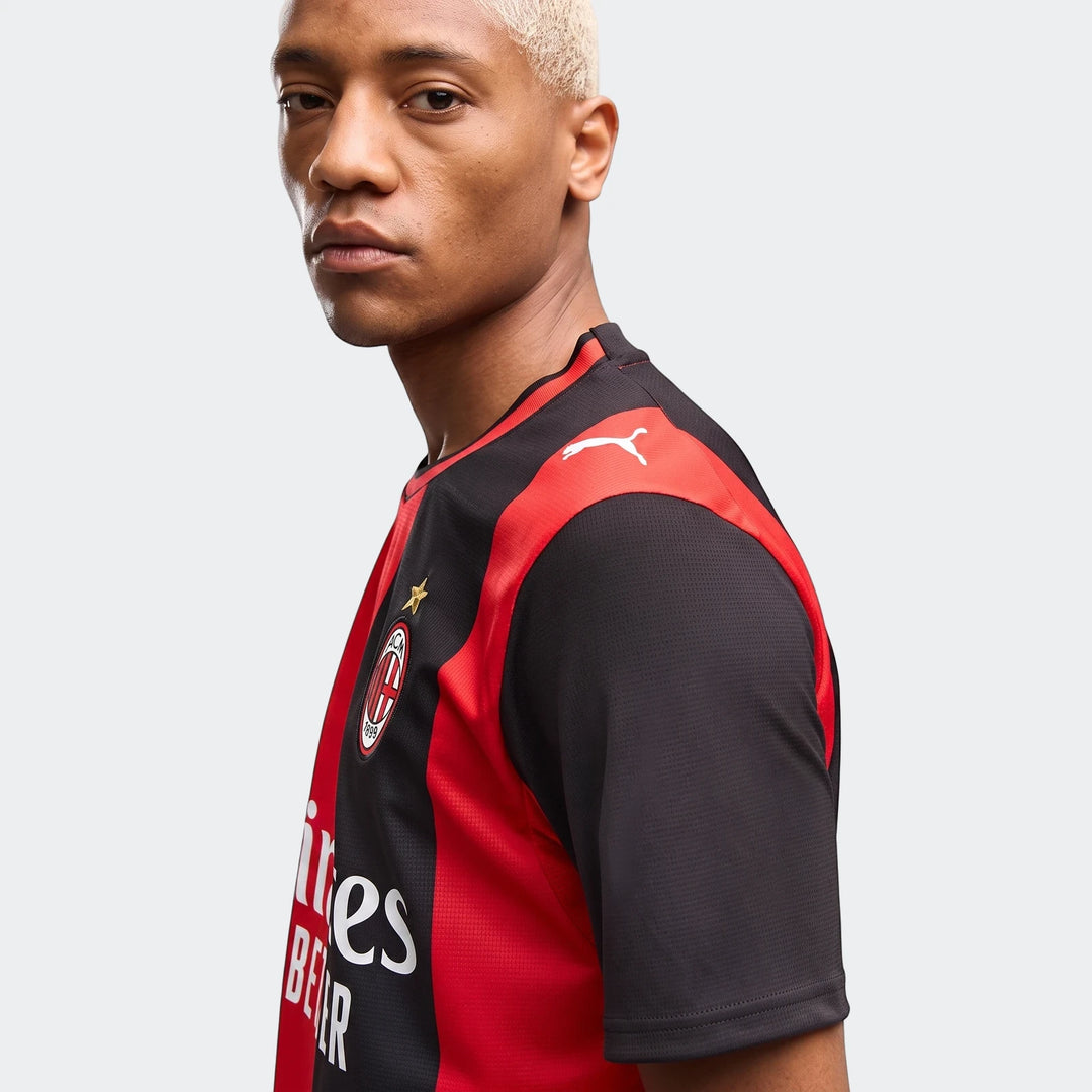 AC Milan 26/27 Home Jersey for men in red and black featuring team crest and Puma logo on the sleeve.