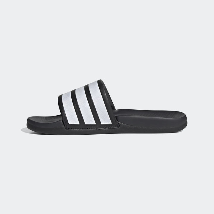 Adidas Adilette Comfort 2.0 Slides in black with white stripes, shown in a side view on a plain background.