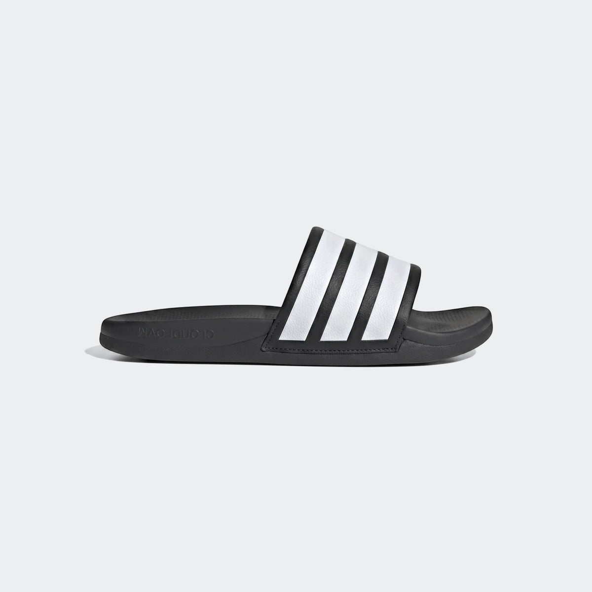 Black Adidas Adilette Comfort 2.0 slides featuring iconic white stripes, presented in a clear side view.