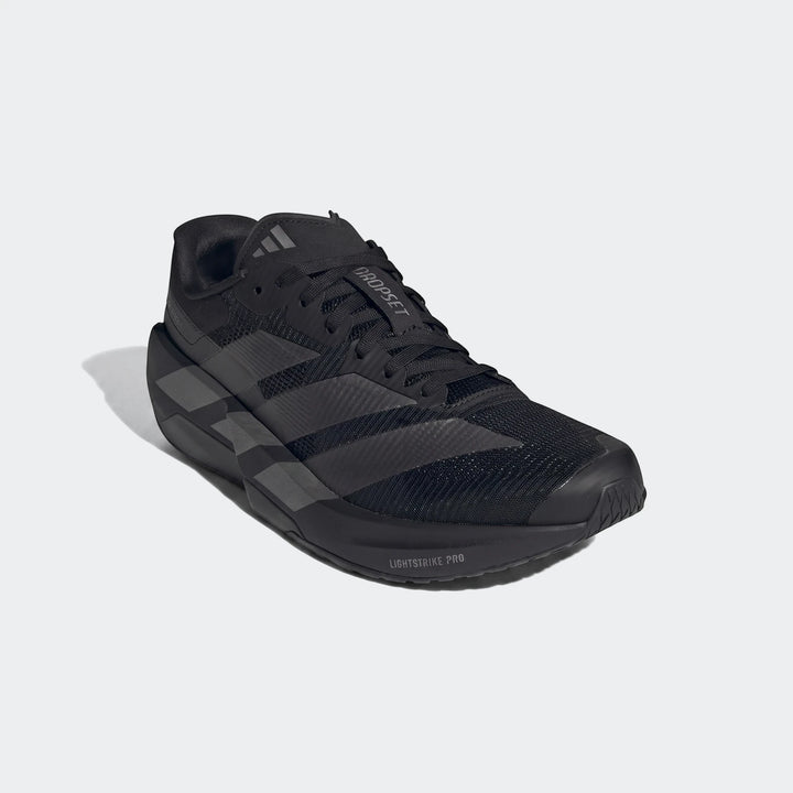 Black Adidas Adizero Dropset Pro training shoe with 'DROPSET' and 'LIGHTSTRIKE PRO' text, shown from a slightly angled view.