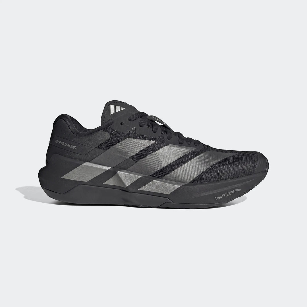 Black Adidas Adizero Dropset Pro training shoes for men, featuring silver stripes and a chunky sole, shown from the side.