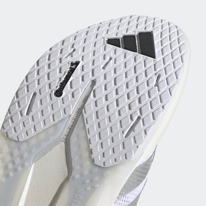 Close-up of the white sole of an Adidas Adizero Dropset Pro training shoe, showcasing the diamond tread pattern, black