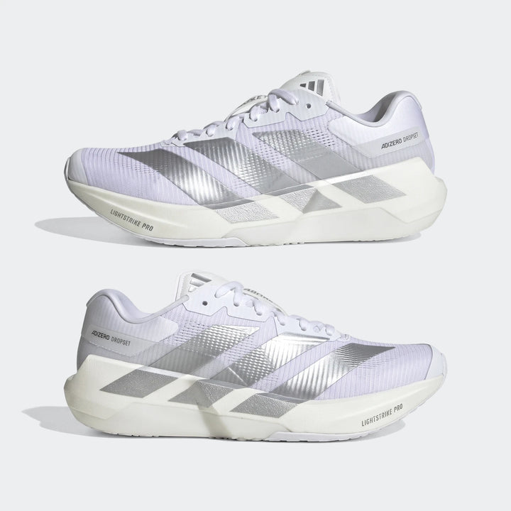 Two white and silver Adidas Adizero Dropset Pro Training Shoes displayed from a side profile view.