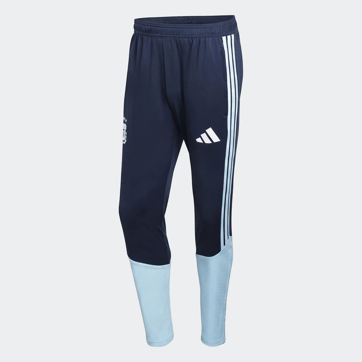 Navy blue and light blue Adidas Argentina training pants, featuring the club crest and Adidas logo, shown in a full-length