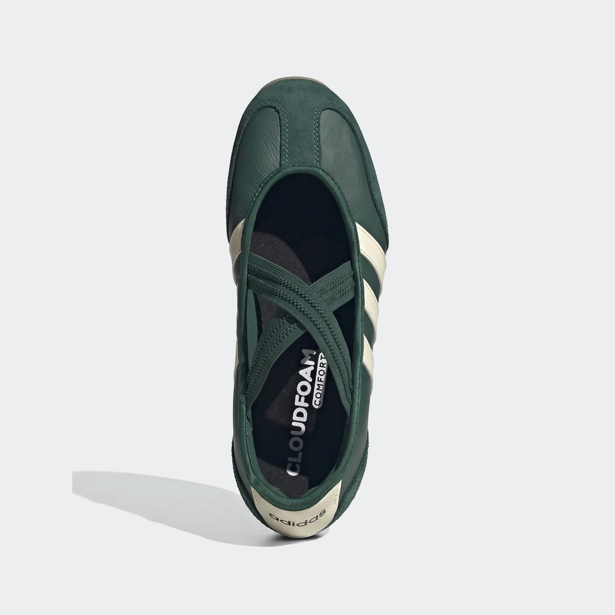 Dark green Adidas Barreda Mary Jane shoe for women, featuring cream stripes and criss-cross straps, viewed from above on a