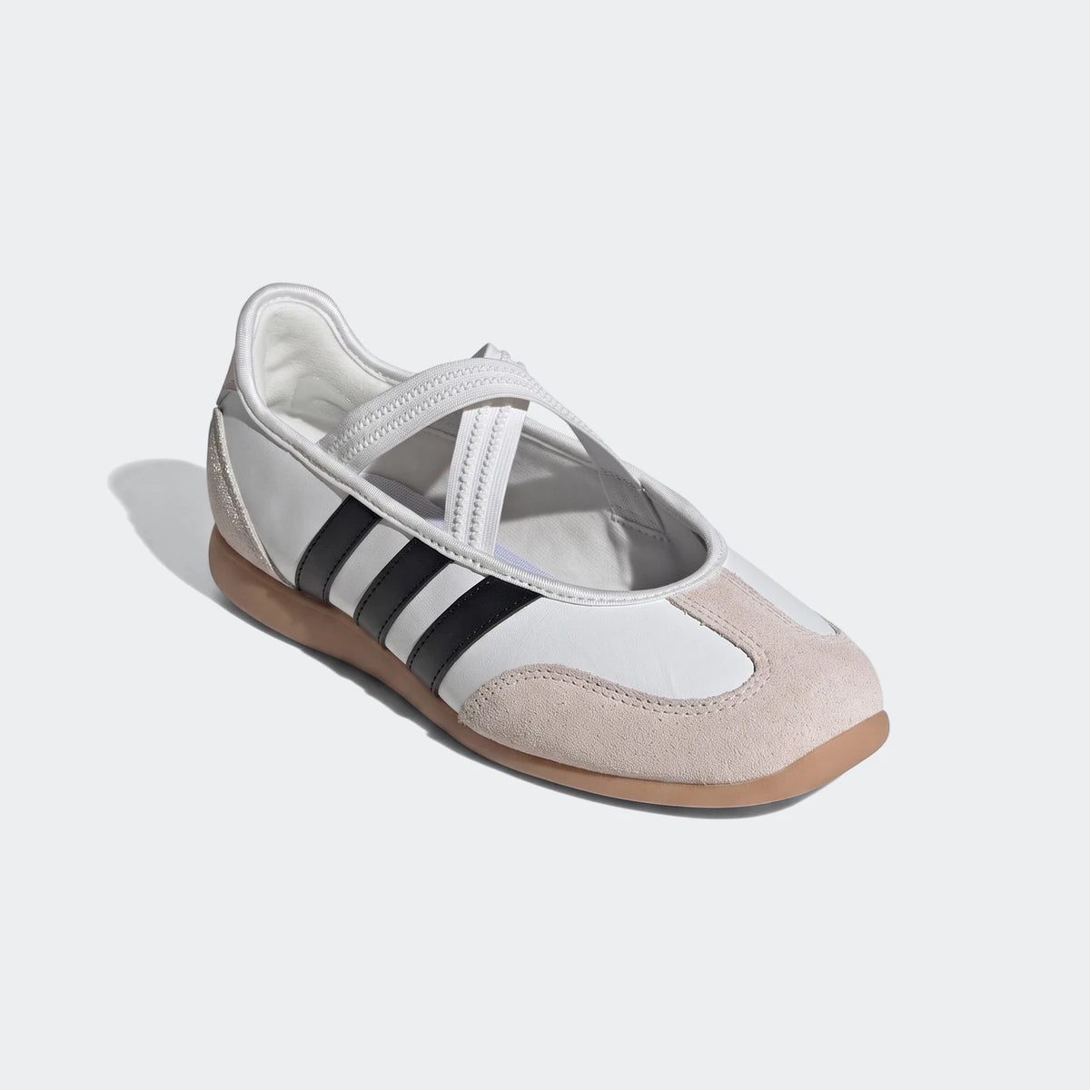 Adidas Barreda Mary Jane Shoes in white with black stripes, beige suede toe and heel, and elastic criss-cross straps, side