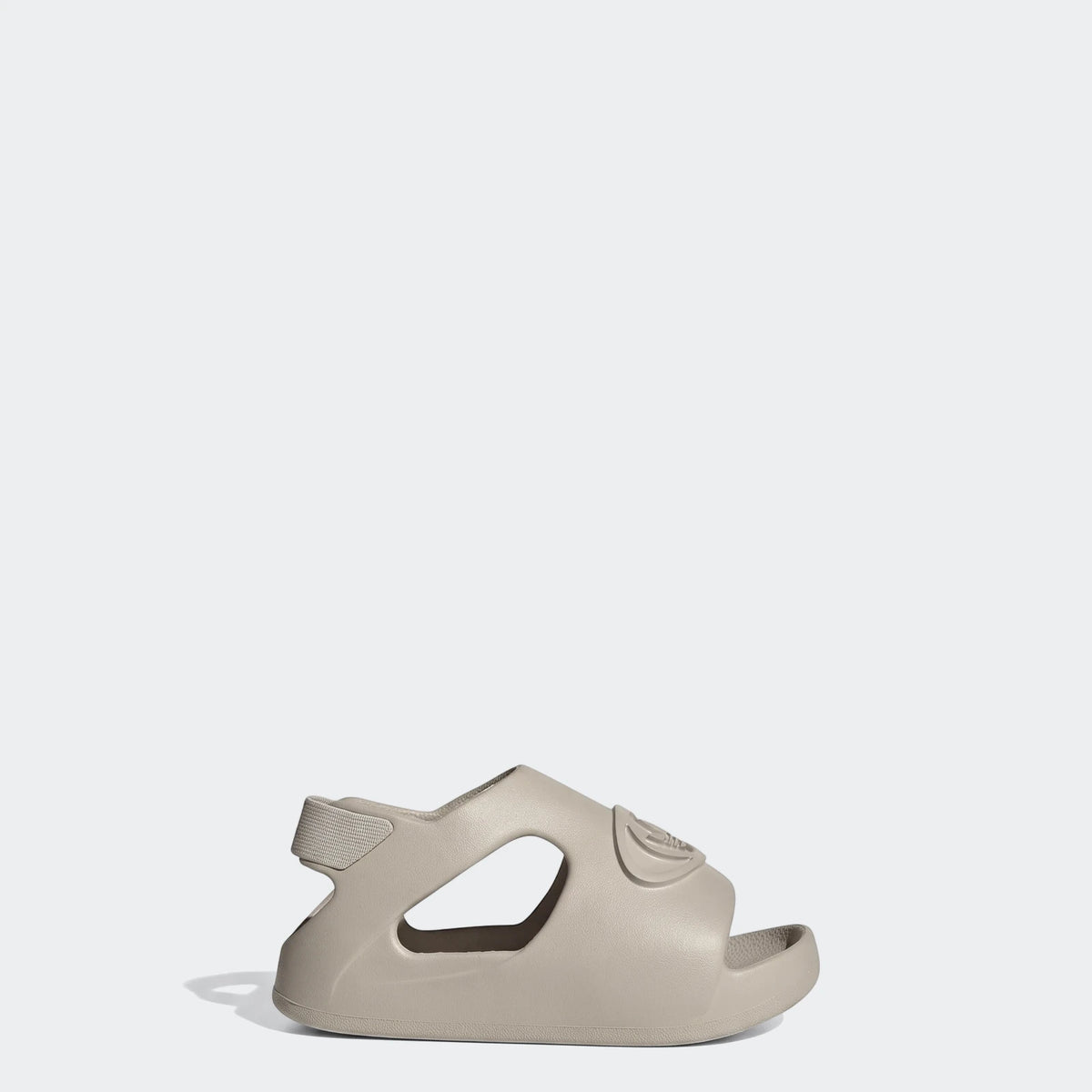 Beige Adidas Campus 00S Foam Slide for toddlers, designed for lightweight comfort, shown from a side view.