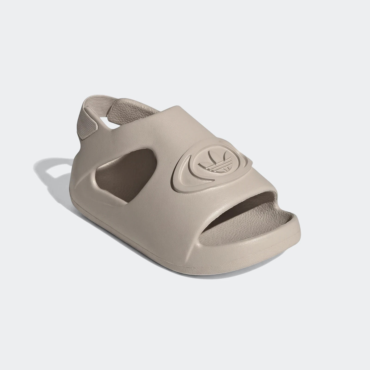 Adidas Campus 00S Foam Slide in light beige, a single molded slide sandal with an adjustable slingback strap and Trefoil