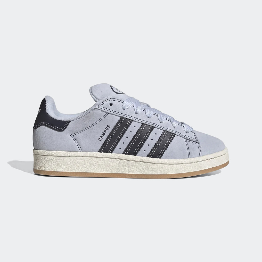 Adidas Campus 00S shoes in light blue suede with dark stripes, a white midsole, and gum outsole, shown in a side view.