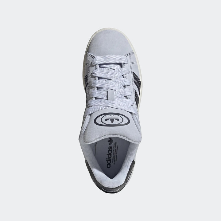 Light blue Adidas Campus 00S suede sneakers with black stripes and white sole, viewed from directly above.