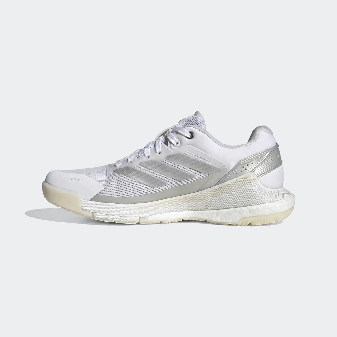 White and silver Adidas Crazyquick Boost Padel Shoes, featuring the iconic three stripes and a textured mesh upper, shown in