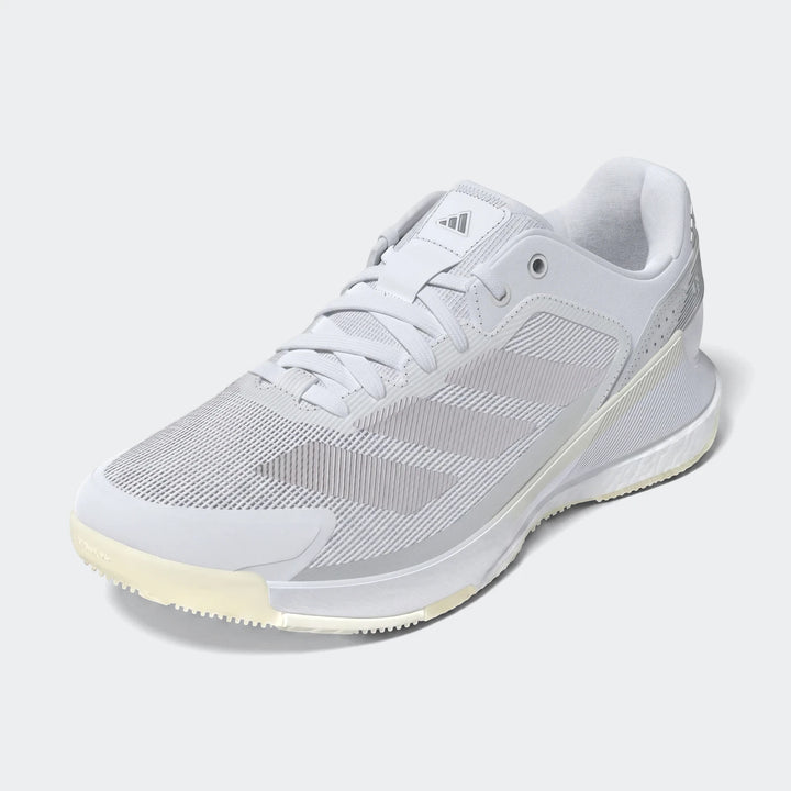 White and light gray Adidas Crazyquick Boost Padel Shoes, featuring mesh construction and synthetic overlays, showcased in a