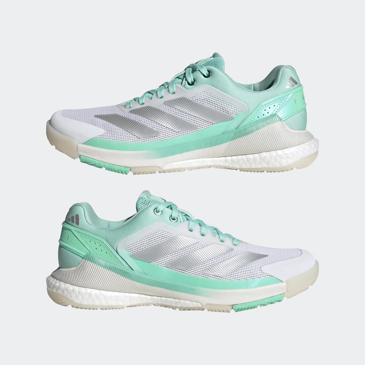 Pair of Adidas Crazyquick Boost Padel Shoes in white and mint green, featuring a mesh upper and Boost sole, shown in a side