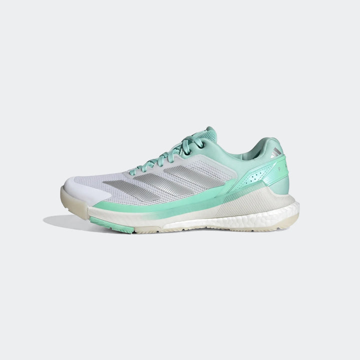 White Adidas Crazyquick Boost Padel Shoes with silver stripes and mint green accents, shown in a side profile view.