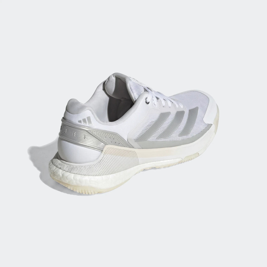 White and silver Adidas Crazyquick Boost Padel Shoes, featuring Boost sole technology, shown in a floating side-back view.