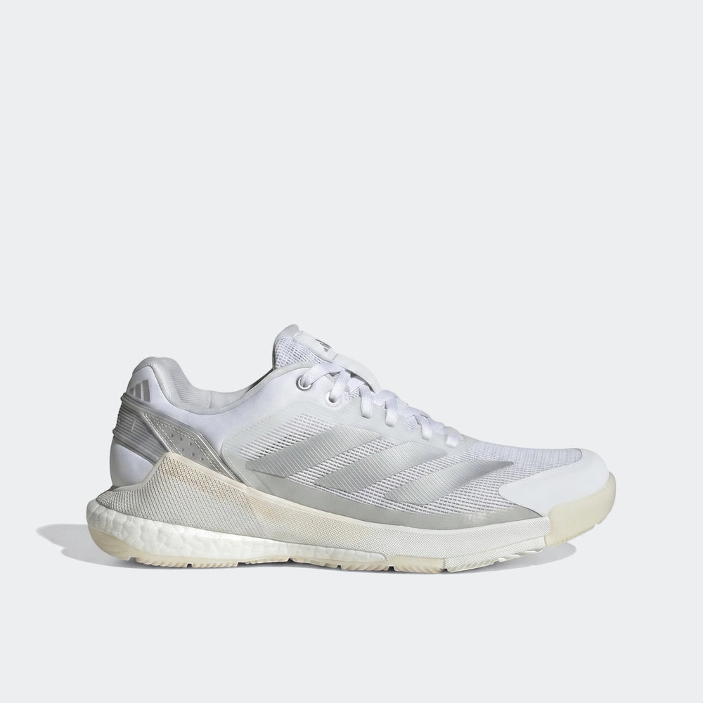 Side view of Adidas Crazyquick Boost Padel Shoes in white and silver, featuring a mesh upper and Boost midsole.