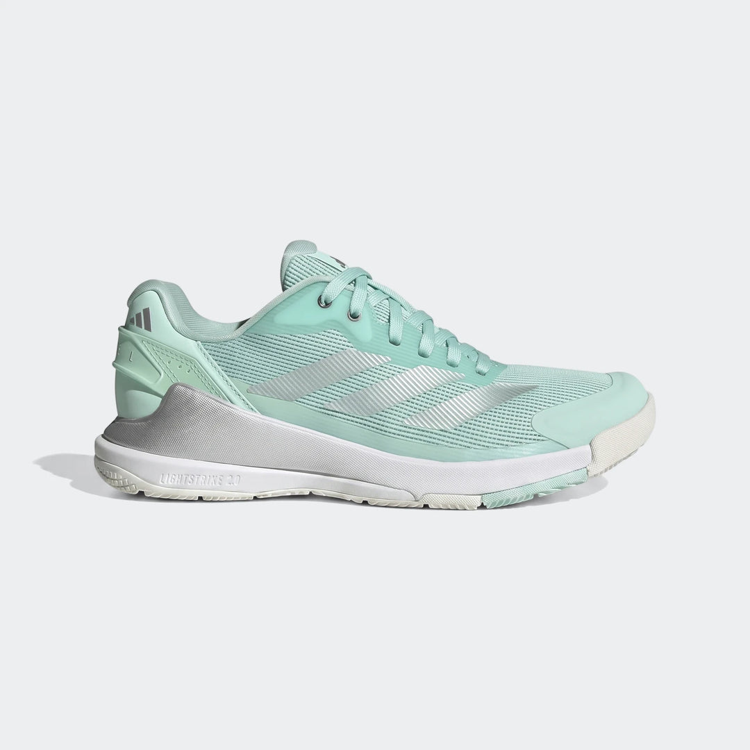 Mint green and silver Adidas Crazyquick Lightstrike Padel Shoes, athletic footwear for performance, shown in a side view.