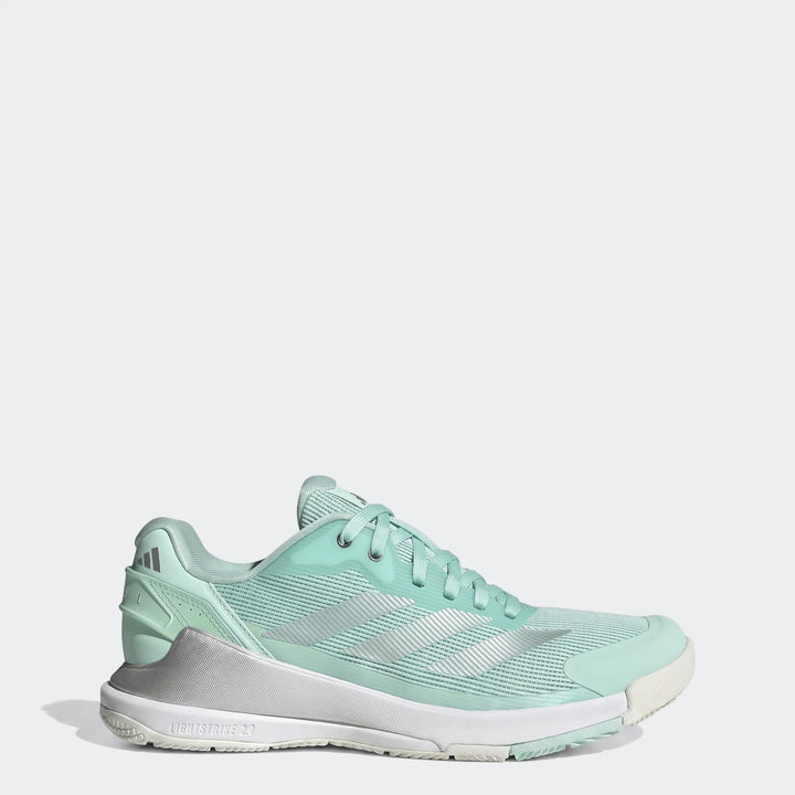 Adidas Crazyquick Lightstrike Padel Shoes, mint green with silver stripes and mesh upper, side profile view.