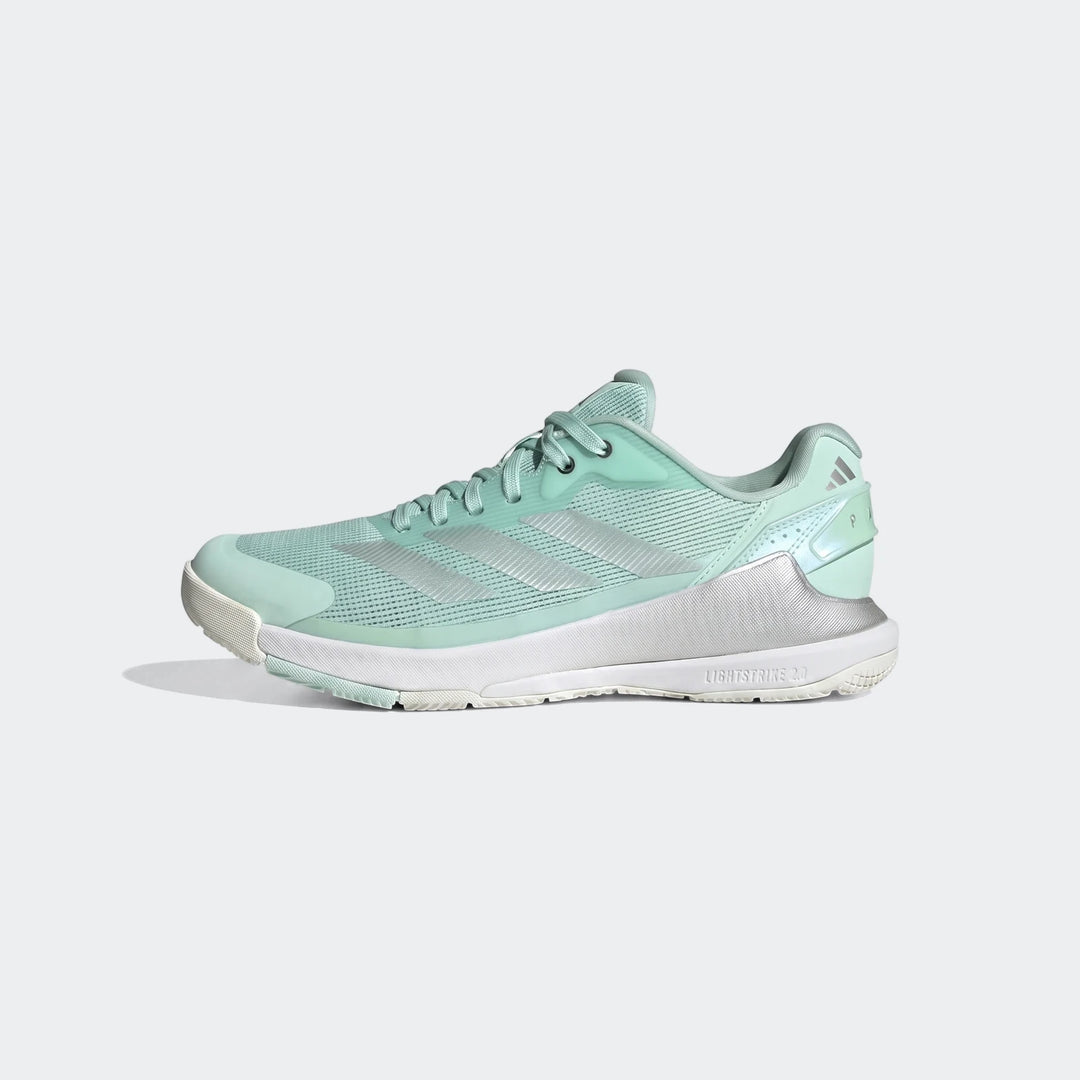 Mint green and silver Adidas Crazyquick Lightstrike Padel Shoes, featuring mesh and synthetic materials, viewed from the