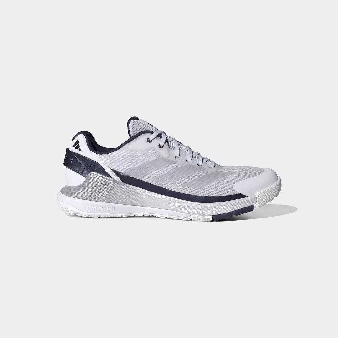 White and dark blue Adidas Crazyquick Padel Shoes, featuring mesh upper and Lightstrike cushioning, side view.
