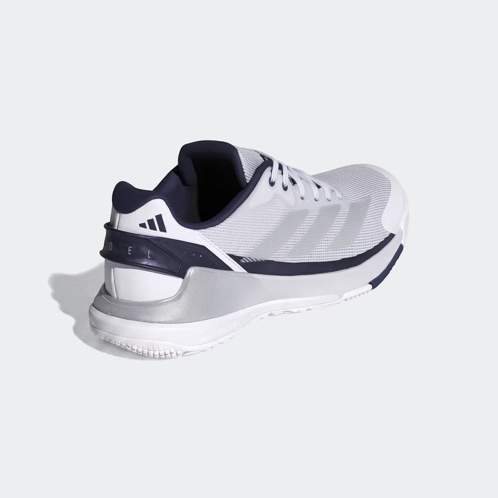 White and navy Adidas Crazyquick Padel Shoes, designed for athletic performance, viewed from a rear-quarter angle.