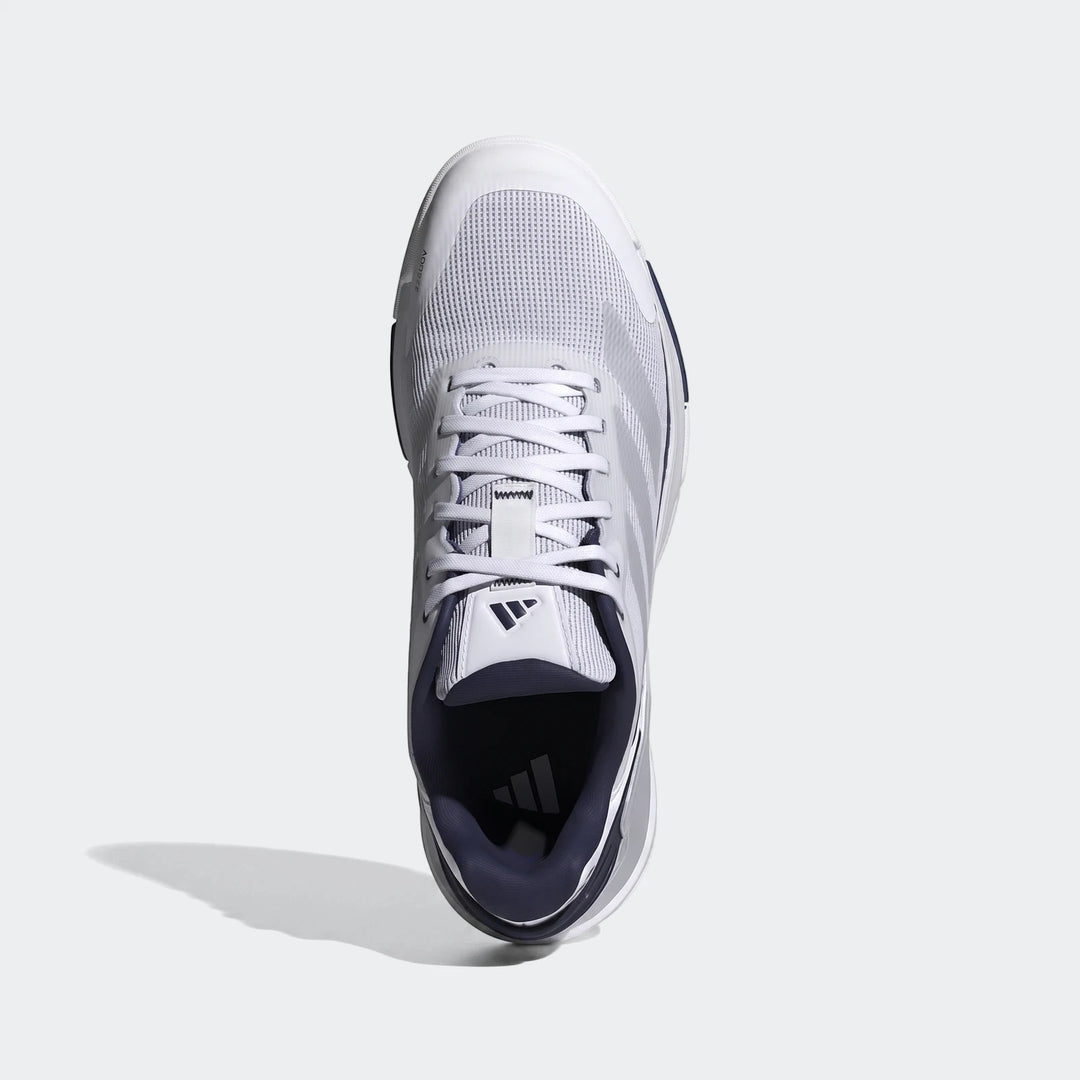 Adidas Crazyquick Padel Shoes in white and navy, featuring mesh upper and visible laces, photographed from an overhead view.