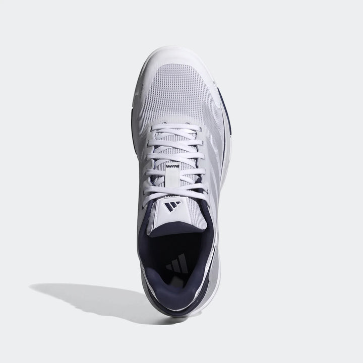 Adidas Crazyquick Padel Shoes in white and navy, featuring mesh upper and visible laces, photographed from an overhead view.