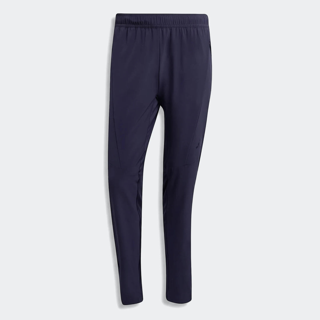 Navy blue Adidas D4T Hybrid Pants in a flat-lay arrangement, showcasing their athletic design and elastic waistband.