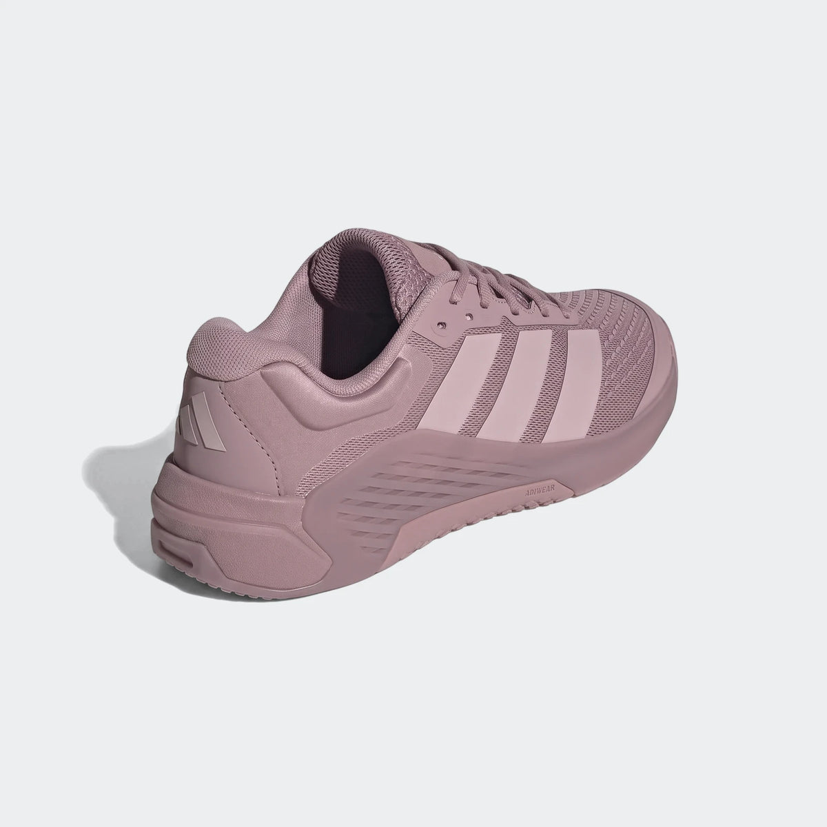 Adidas Dropset 4 Training Shoes in dusty rose/mauve mesh, featuring iconic three stripes, visible from a side-rear angle.