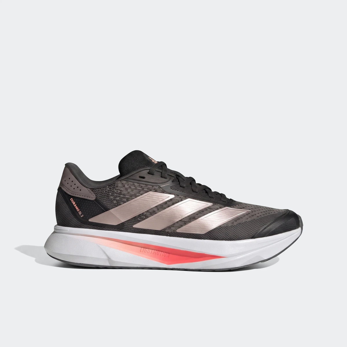 Adidas Duramo SL 2 running shoes in black with rose gold stripes and a white midsole, shown from a side view.