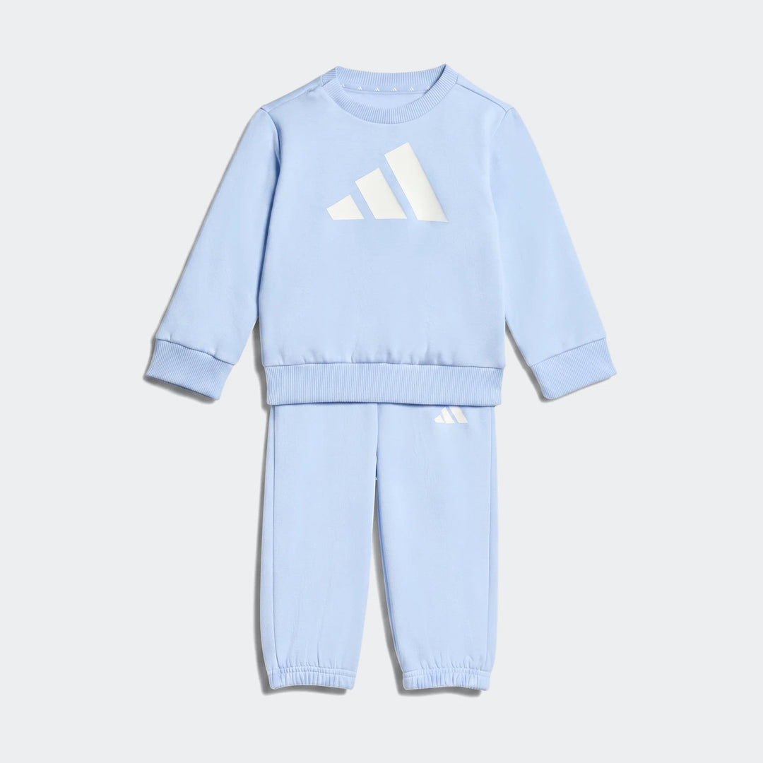 Light blue Adidas Essentials Jogger Set for kids, featuring a crewneck sweatshirt with a large white logo and matching
