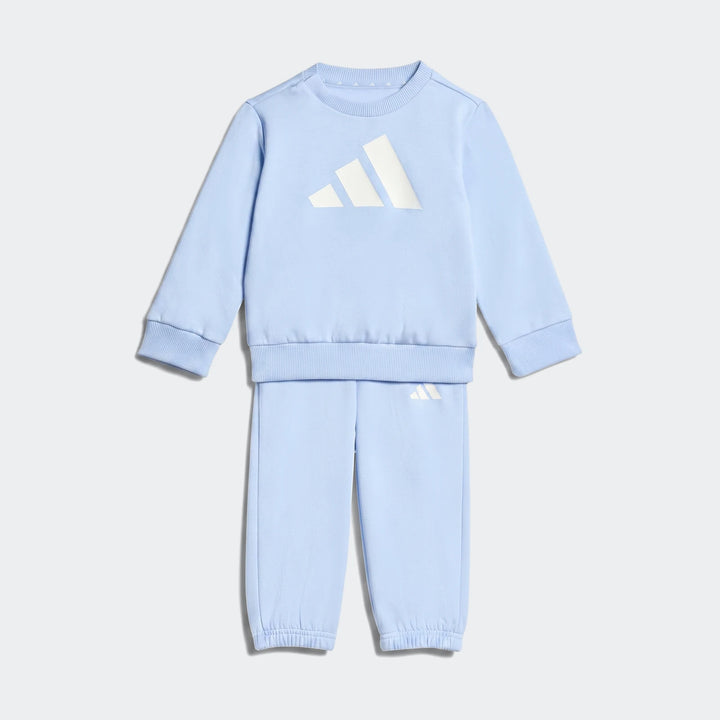 Light blue Adidas Essentials Jogger Set for kids, featuring a crewneck sweatshirt with a large white logo and matching