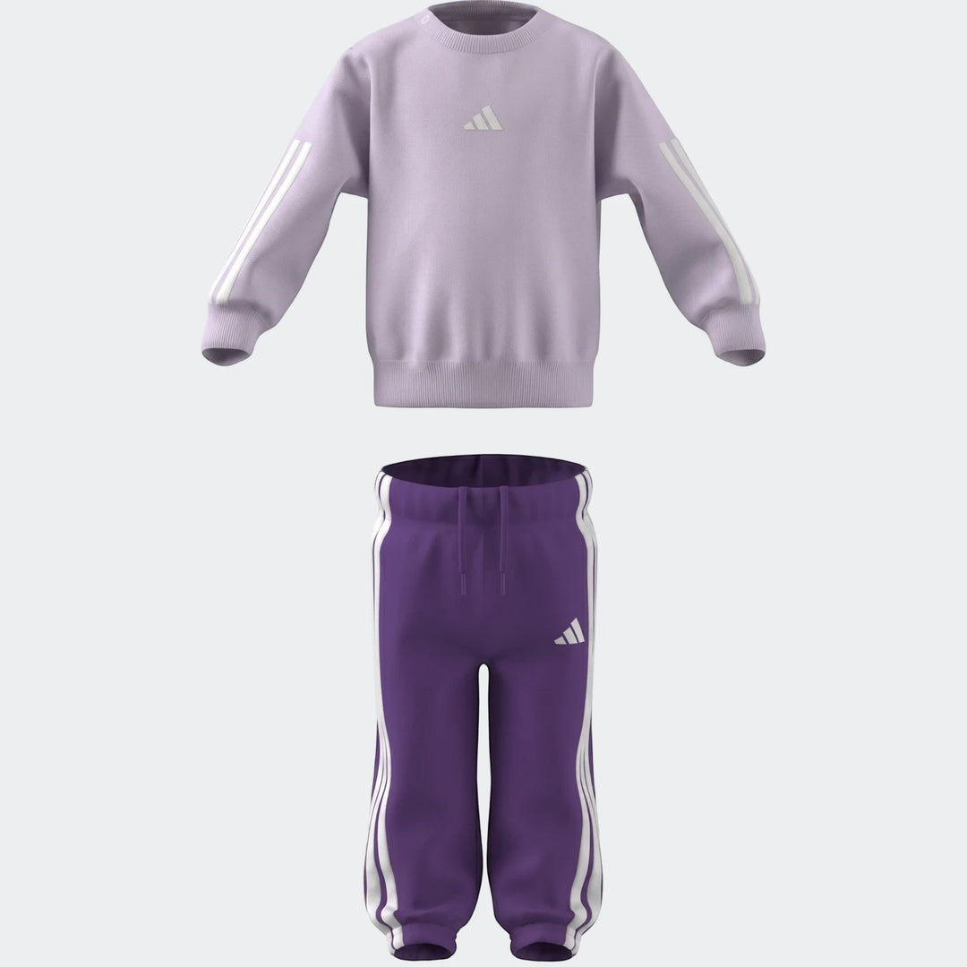 Adidas Essentials Joggers Set Kids featuring a lavender crewneck sweatshirt and purple joggers, both with iconic white