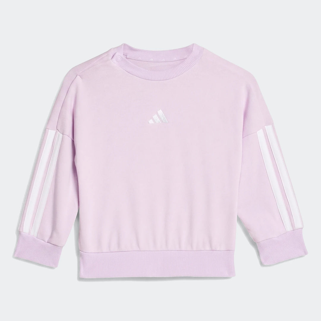 Adidas Essentials Kids' Crewneck Sweatshirt in light lilac with white three-stripes on sleeves and ribbed details.