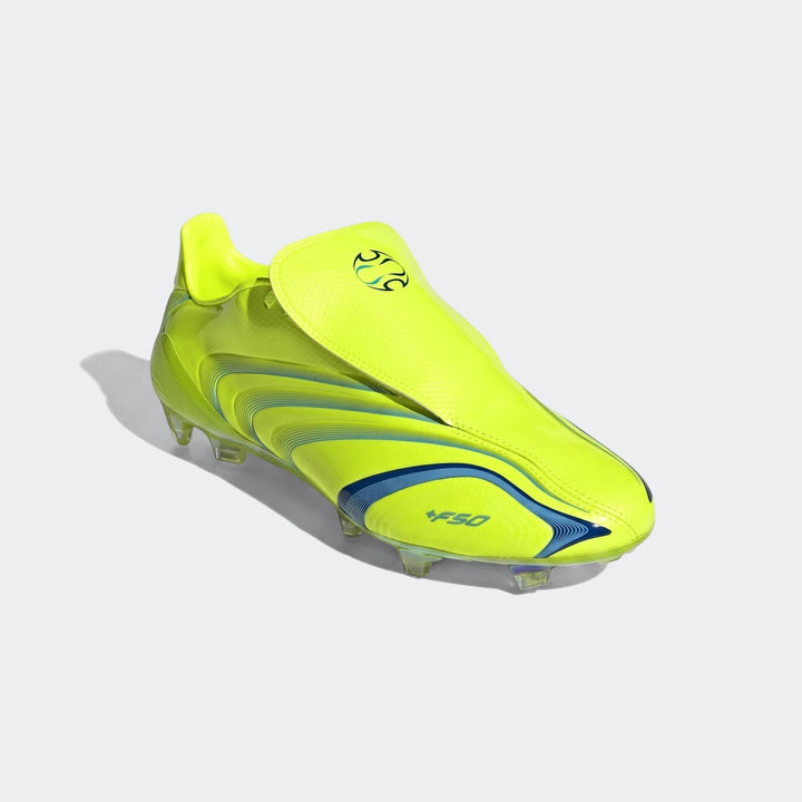Yellow Adidas F50 Elite Fg Tunit football boot with blue stripes, shown at an angled view, highlighting design details.