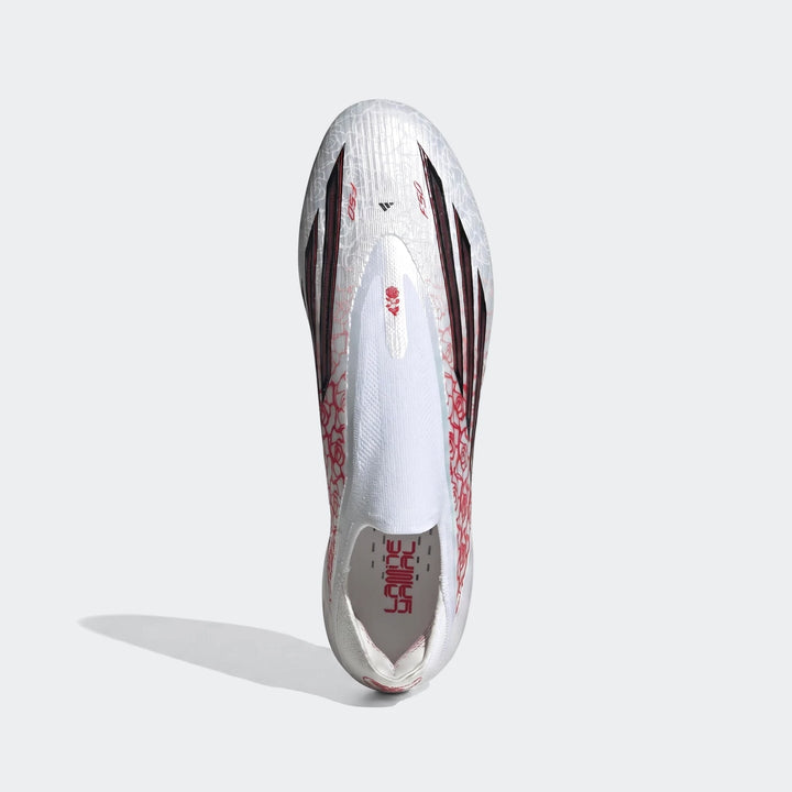Top-down view of Adidas F50 Elite LL FG Lamine Yamal football boots in white, featuring black stripes and red floral