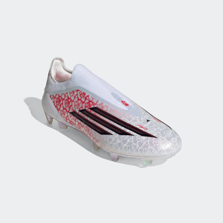 White and red Adidas F50 Elite Ll Fg Lamine Yamal football boots with rose pattern and black stripes, angled view.