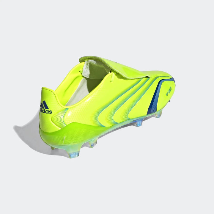 Adidas F50 football boot in vibrant lime green with blue accents, showcasing the iconic design from a three-quarter rear