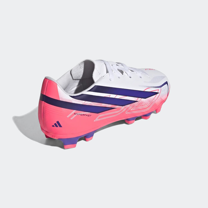 Kids Adidas F50 Hyperfast Club firm ground football boots, featuring a white upper with vibrant pink and purple accents,
