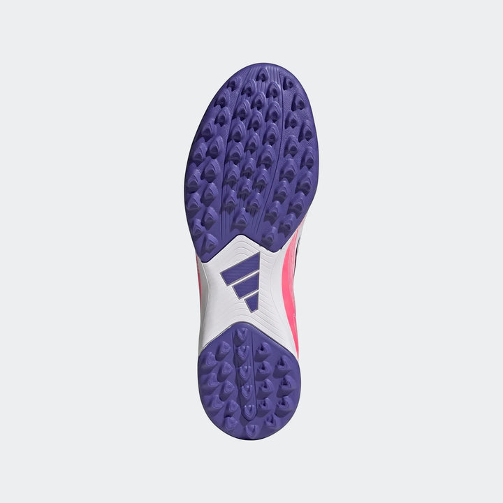 Adidas F50 Hyperfast Club Turf Football Shoes, featuring a vibrant purple studded sole and pink and white accents, viewed