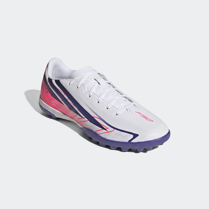 Adidas F50 Hyperfast Club Turf Football Shoes in white with pink and purple accents, featuring a studded sole for optimal