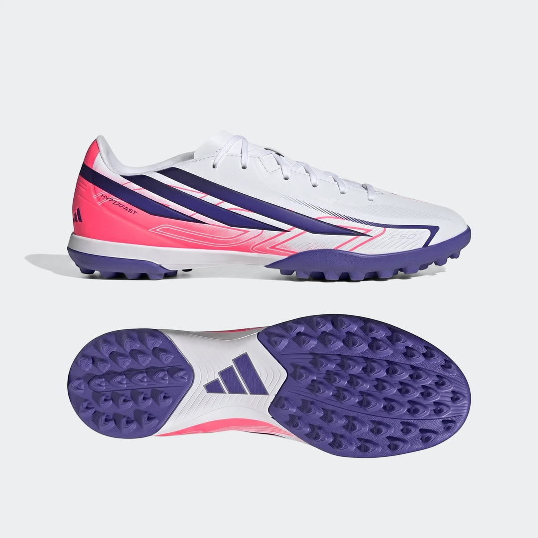 Adidas F50 Hyperfast Club Turf Football Shoes in white, purple, and pink, shown from side and sole views.