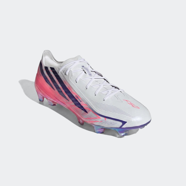 White, pink, and purple Adidas F50 Hyperfast Elite firm ground football boots, angled view, showing laces and iridescent