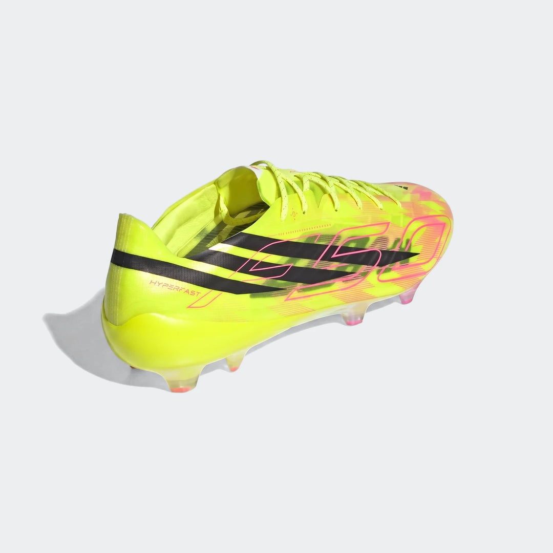 Adidas F50 Hyperfast Evo Firm Ground Football Boot in neon yellow with pink and black accents, shown from a side view.