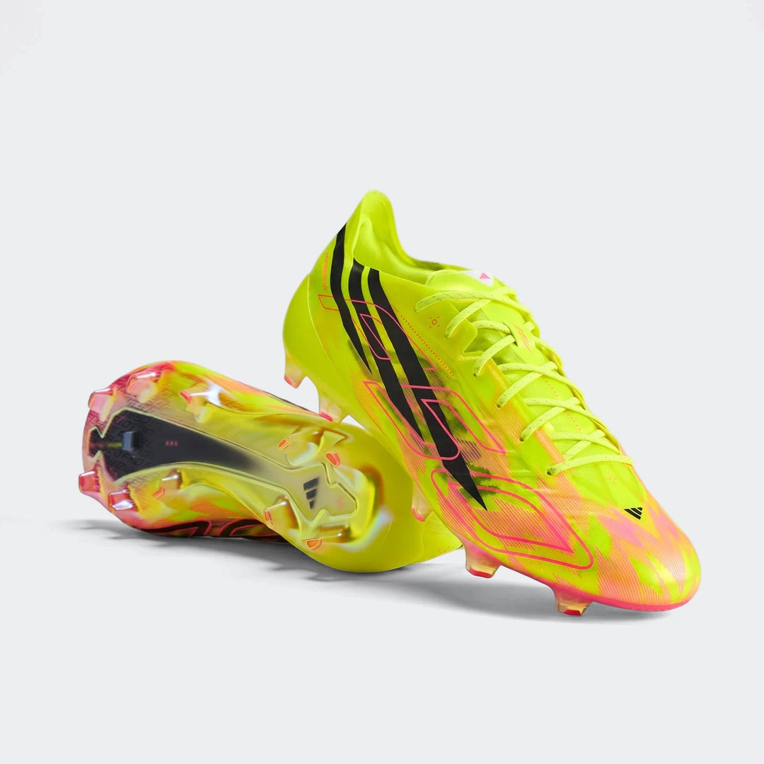 Pair of neon yellow-green and pink Adidas F50 Hyperfast Evo Firm Ground Football Boots with black stripes, side view.