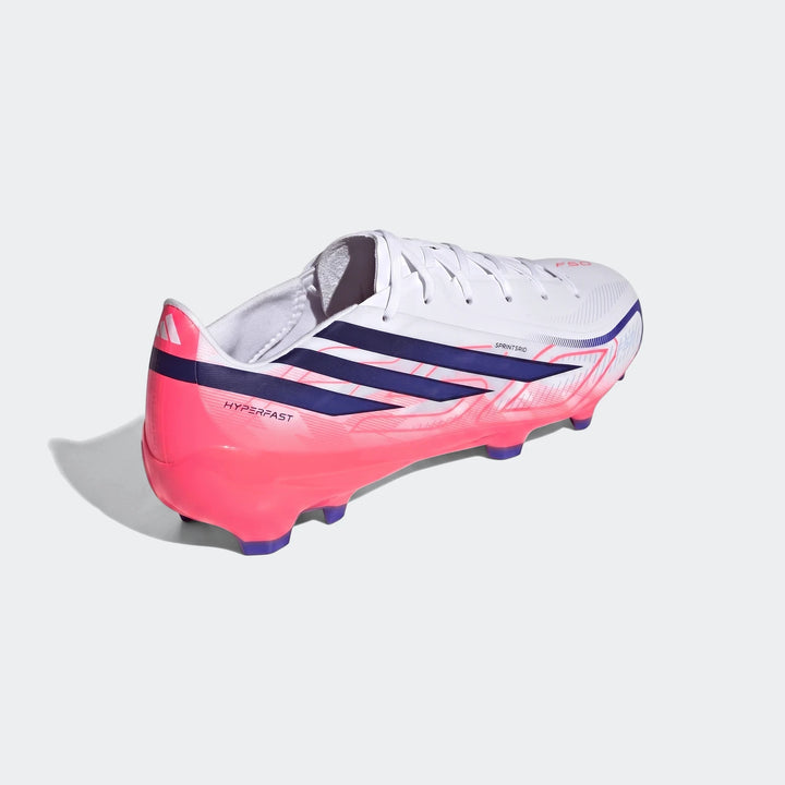 White, pink, and navy Adidas F50 Hyperfast League Firm Ground Football Boot, side view, showing laces and studs.