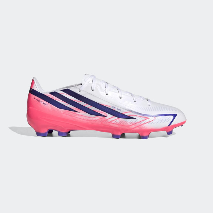 Adidas F50 Hyperfast League Firm Ground Football Boots in white, pink, and blue, with purple studs, shown from the side.