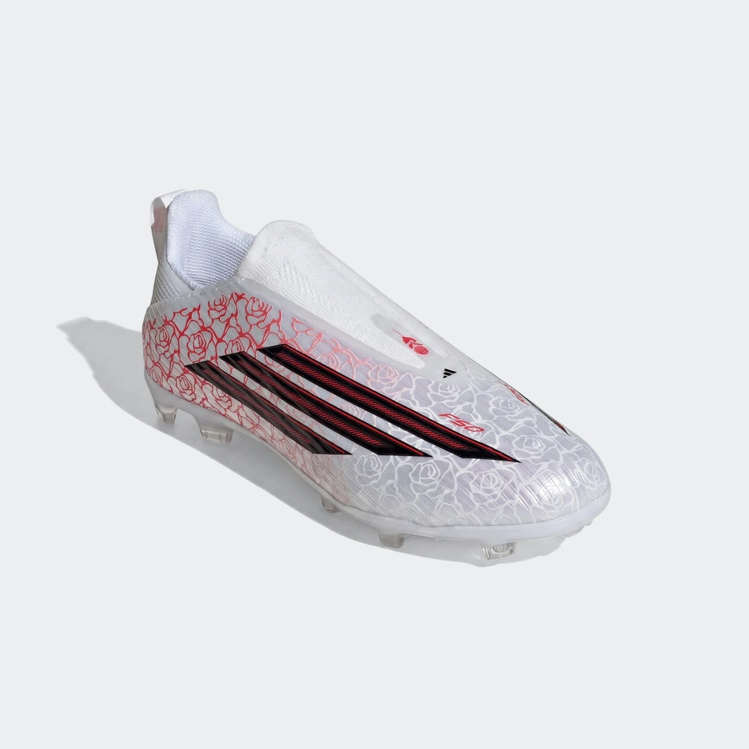 White and red Adidas F50 League Lamine Yamal kids football boots with rose pattern and black stripes, side view.