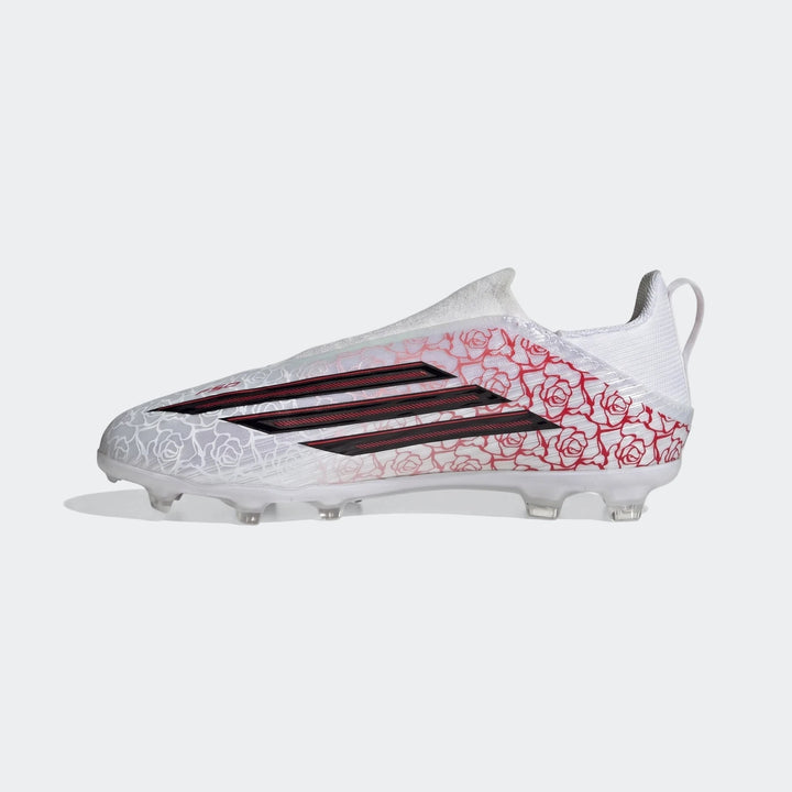 White Adidas F50 League Ll Fg / Mg Lamine Yamal kids football boots with red rose pattern and black stripes, side view.