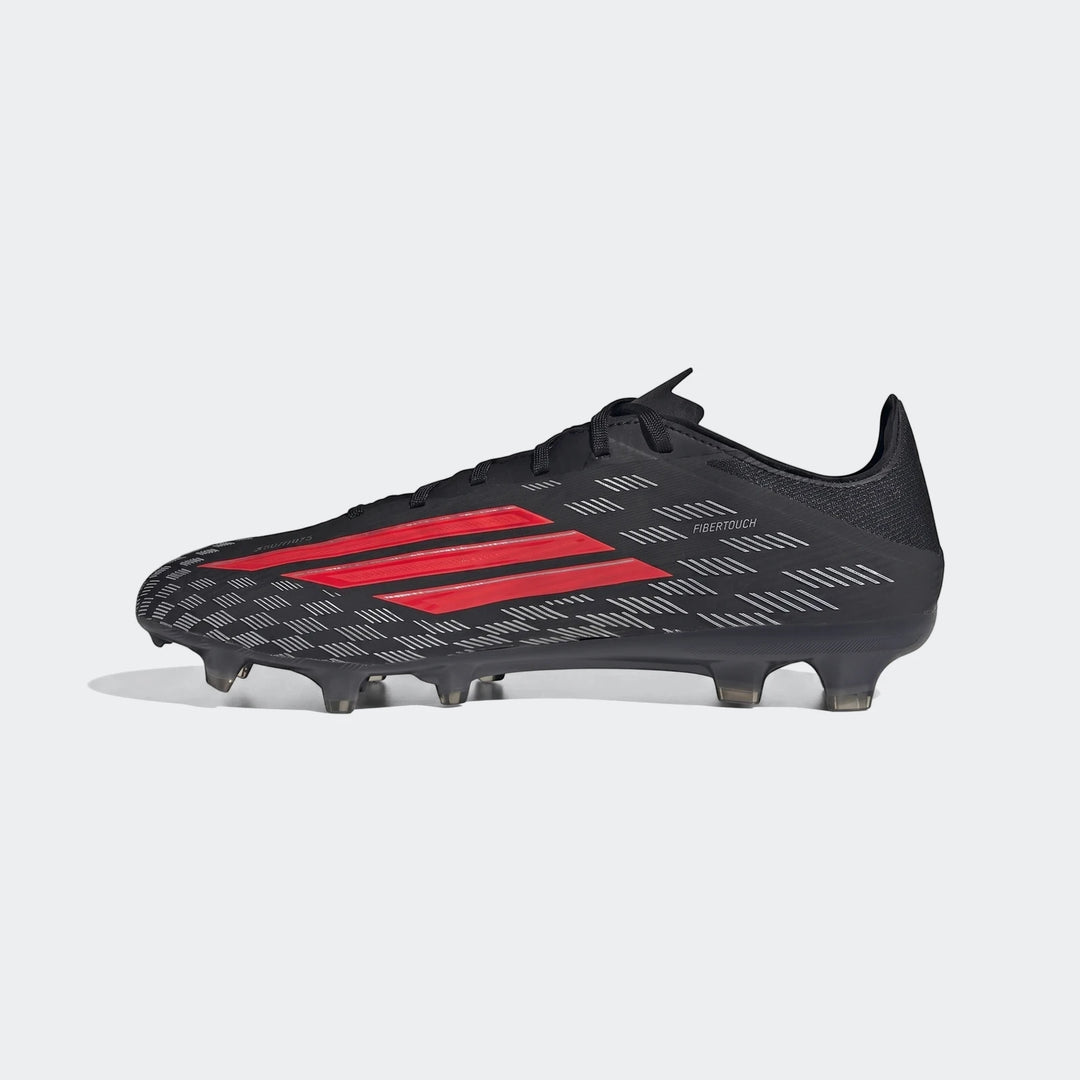 A black and red Adidas F50 Pro Firm Ground Football Boot, viewed from the side, showcasing its design and studs.